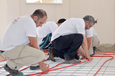 התקנת מערכת חימום תת רצפתי במים בנס הרים